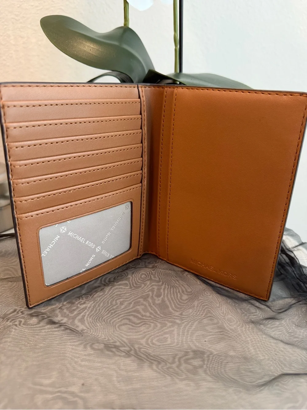 Michael Kors Brown MK Logo Passport Cover with Gold Logo